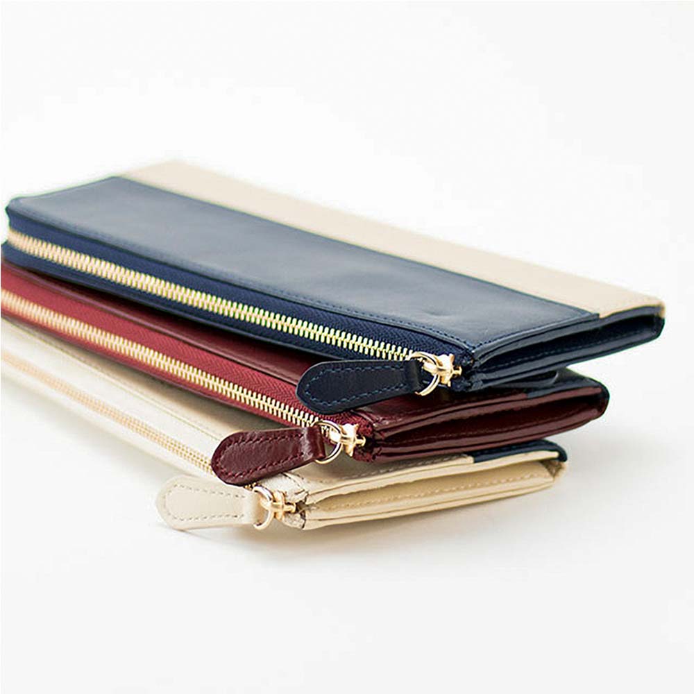 Ｌファスナー長財布（バイカラー） - 丸みのある本革の引き手。ゴールドファスナーが上品さを演出します。外側がバイカラーになっており、色の組み合わせ次第でおしゃれな印象に。カラーの組み合わせを楽しめるのはオーダーメイドならではです。