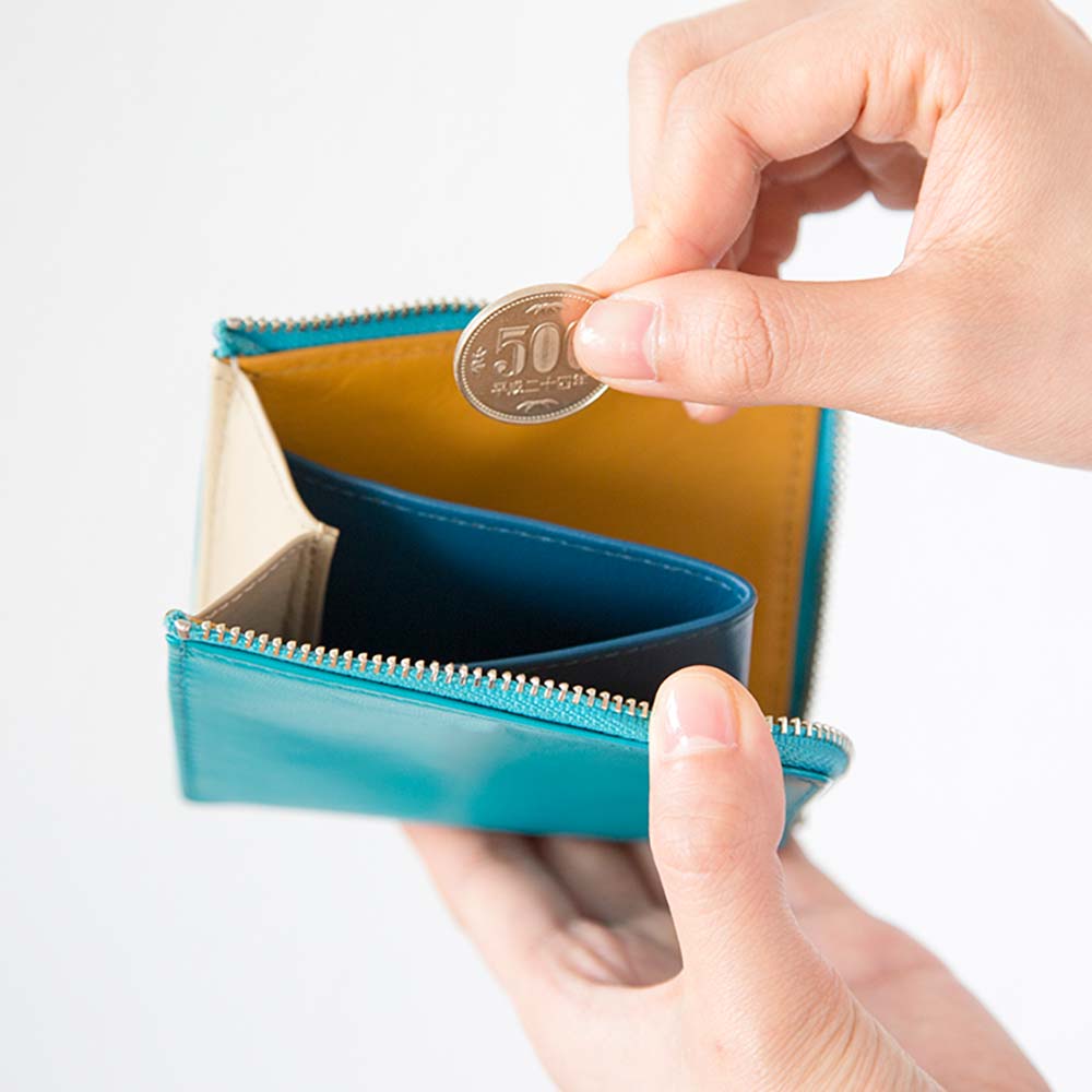 コンパクトウォレット - 取り出しやすいL字ファスナータイプのコンパクトレザーウォレット。中心には小銭入れが付いています。