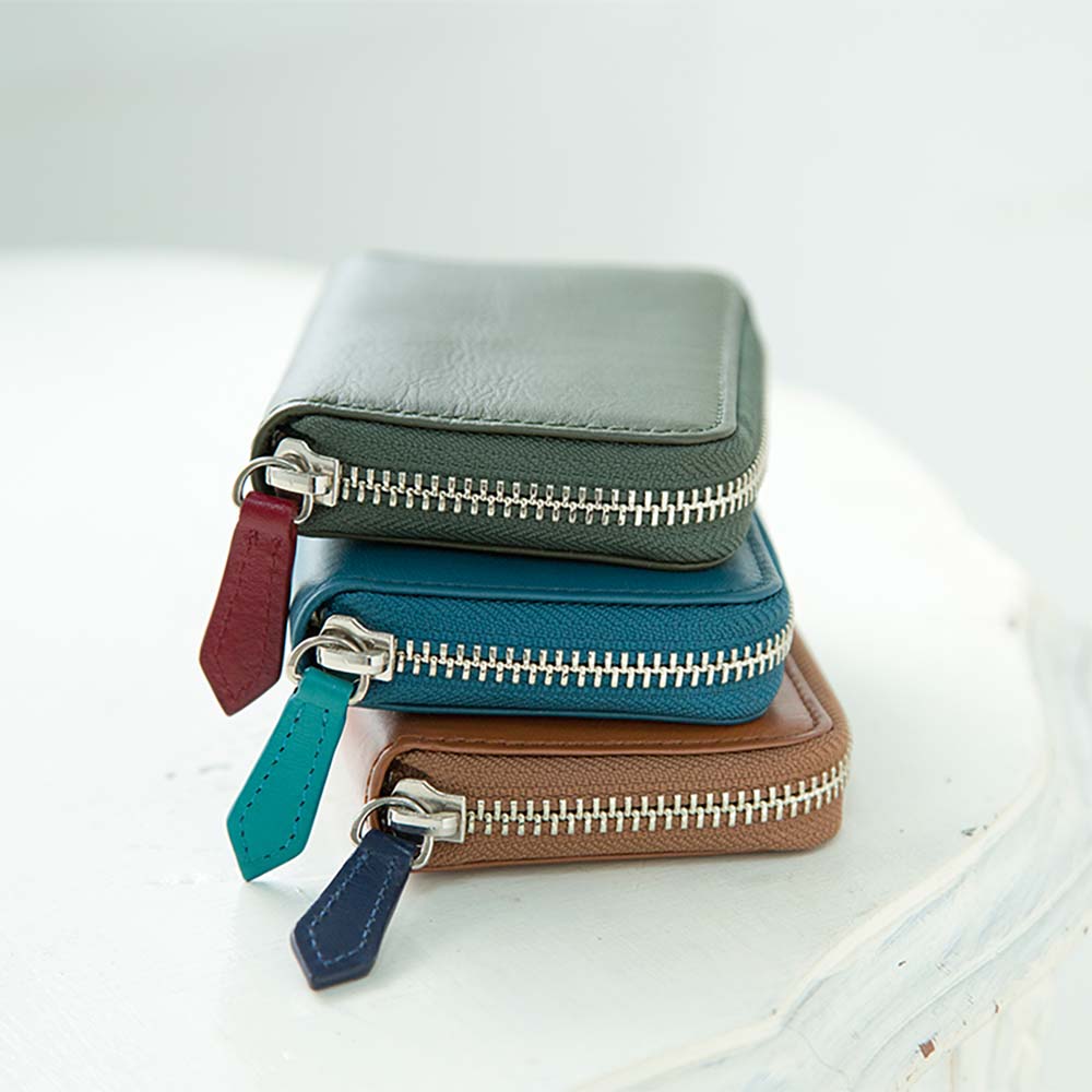 ラウンドキーケース - 本革仕様の引手は、カラーを変えればデザインのアクセントにも。オーダーメイドなため、お好みでおしゃれにもかわいくも演出できます。