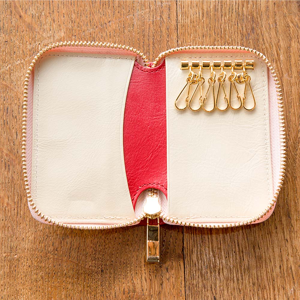 ラウンドキーケース（バイカラー） - 6連のキーチェーンと、2つのフリーポケット。カードキーもまとめて収納できます。お札やカードを入れてサブ財布としても使用できます。