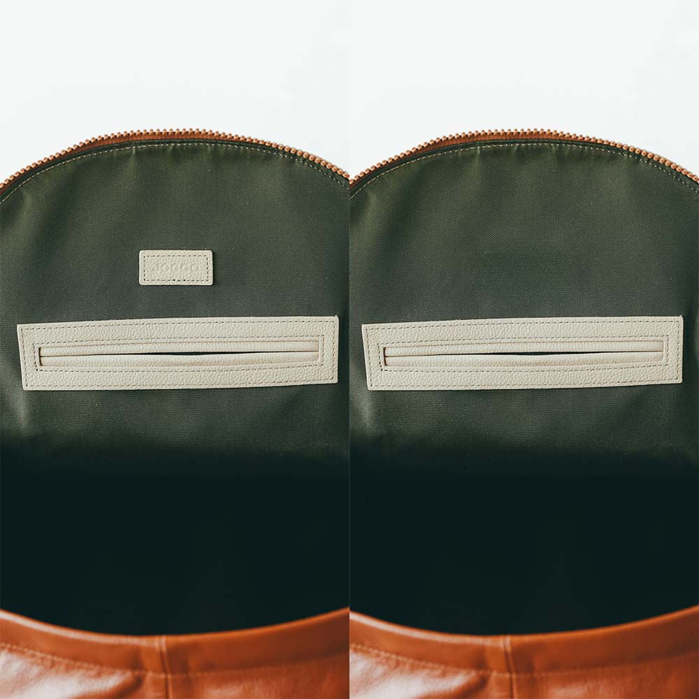 ラウンドレザーバックパック - ロゴはメイン収納の内側正面の上の方に入ります。ロゴ刻印を選択されない場合、ブランドラベルは付属しません。あらかじめご了承ください。