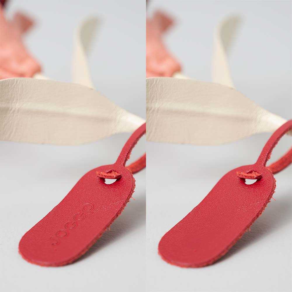 革の一輪花（ユリ） - 茎にはＪＯＧＧＯのロゴが刻印されたブランドタグが付いています。タグの色でアクセントを加えても素敵です。タグは取り外しも可能です。※ロゴ刻印をなしにするとタグのみついてきます。